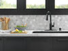 Delta Marca Single Handle Pull-Down Kitchen Faucet with Soap Dispenser and ShieldSpray® Technology in Matte Black